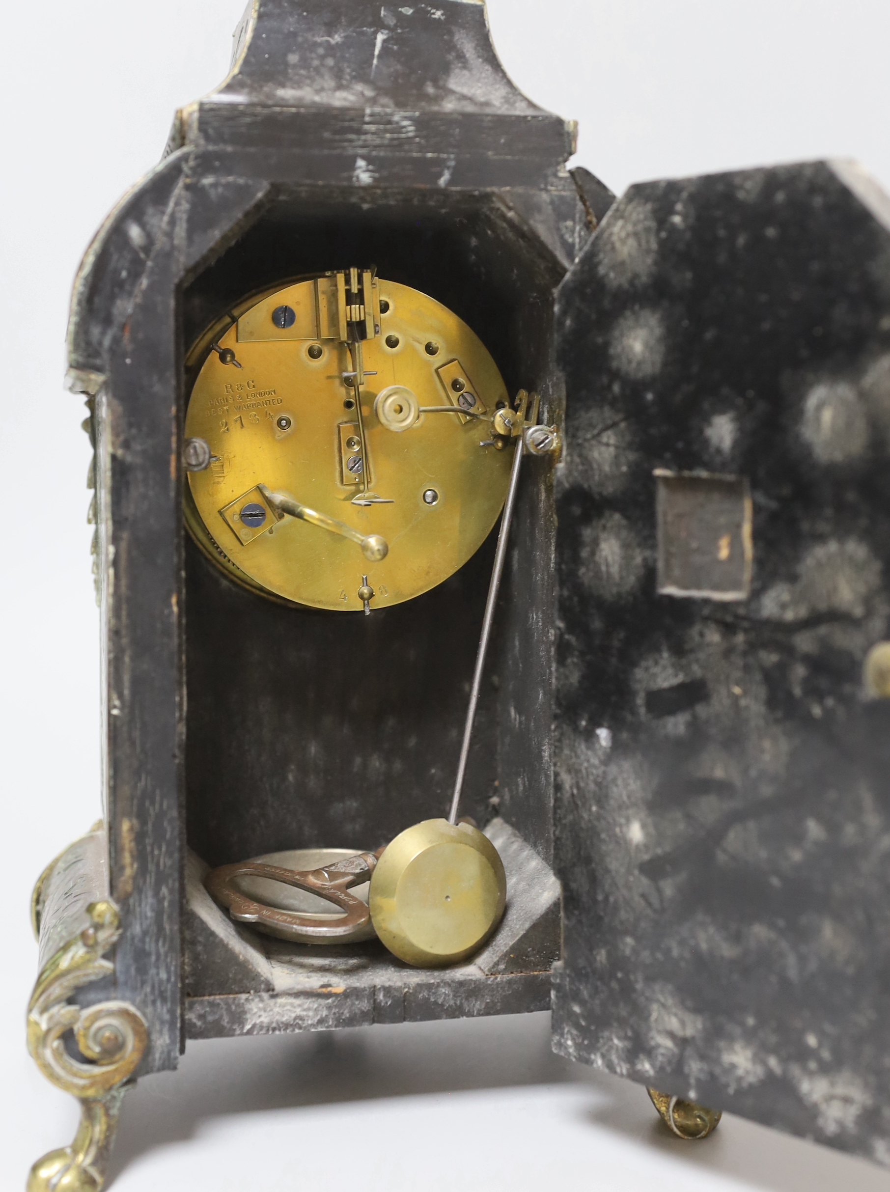 A late 19th century French brass Boulle work mantel clock, with key and pendulum, 30cm high